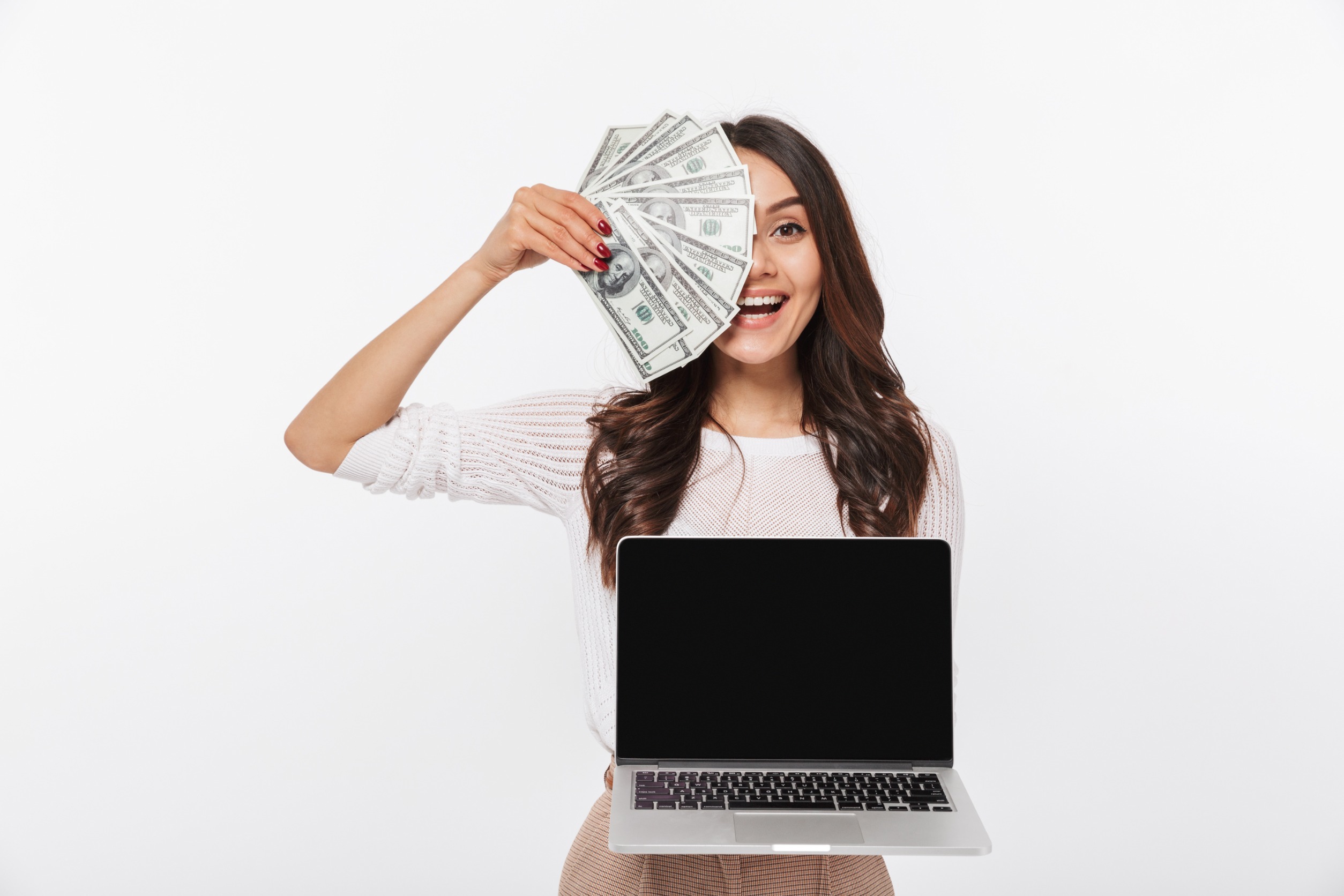 woman with laptop and money