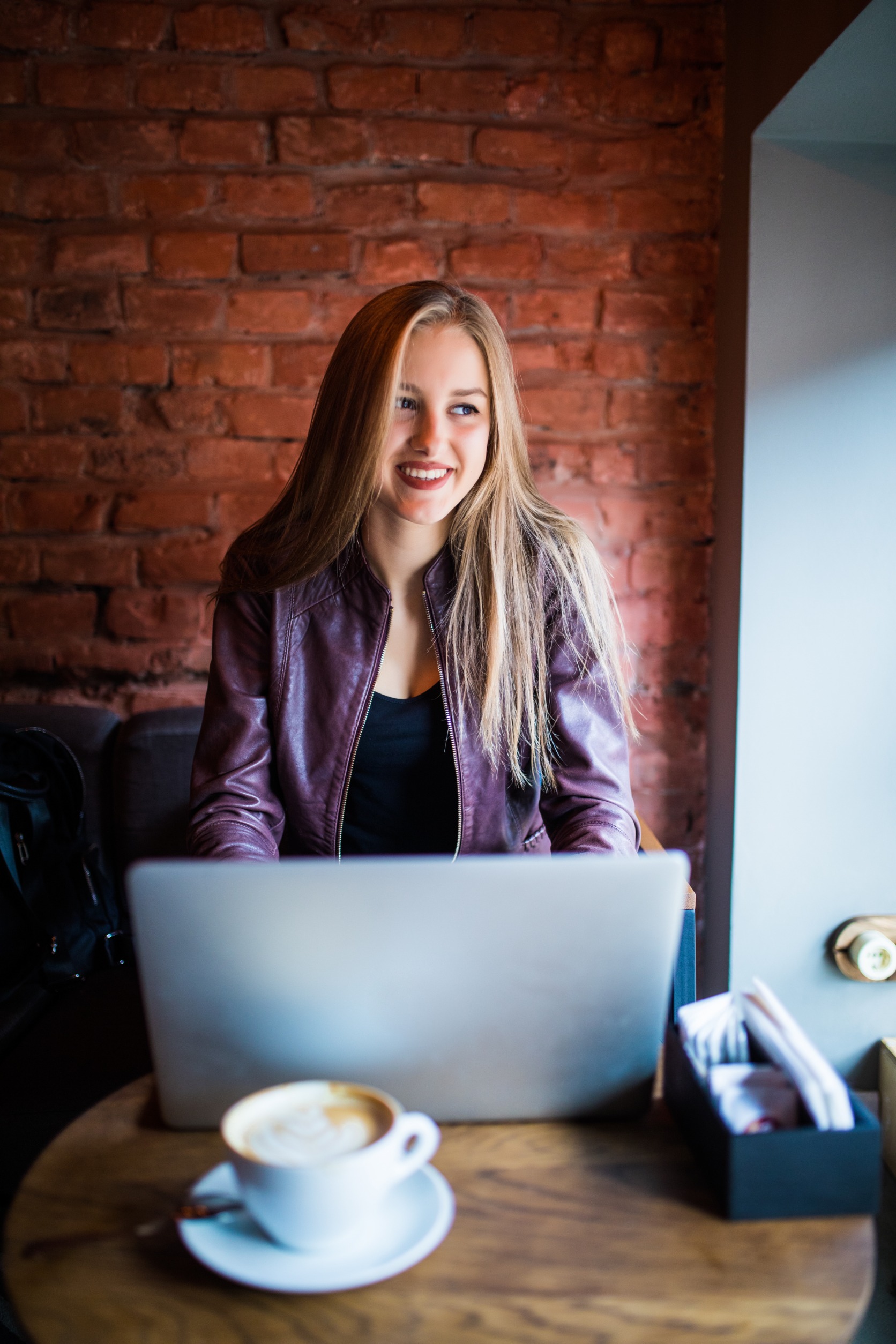 lady at laptop smiling