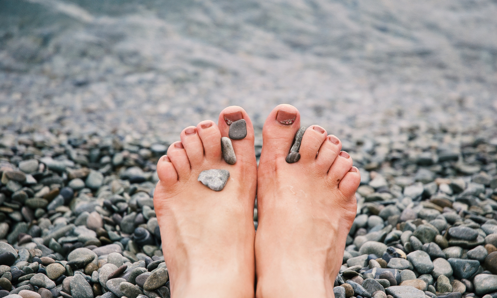 feet on stones